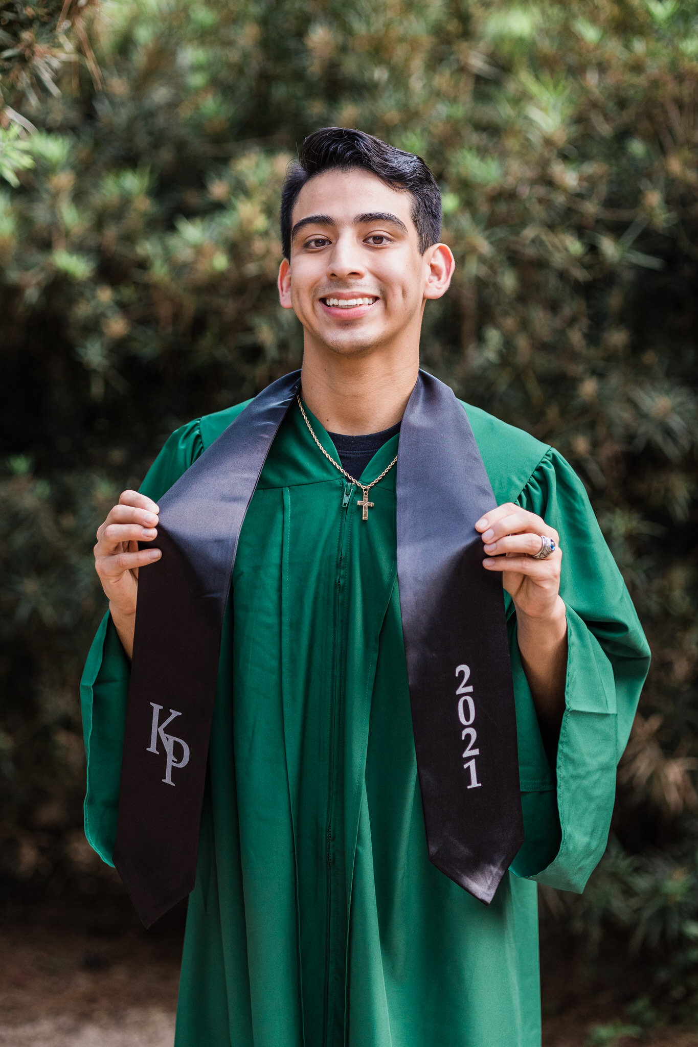 Senior graduate robe pose