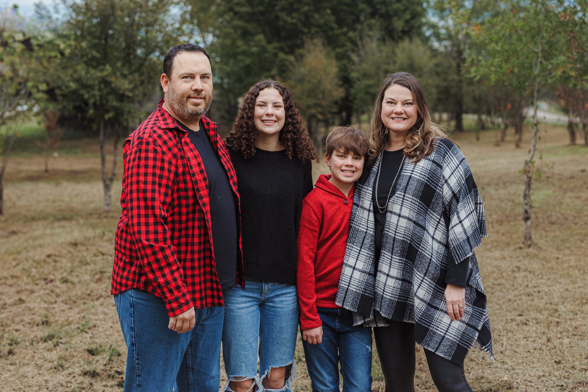 family portraits outdoors greenery