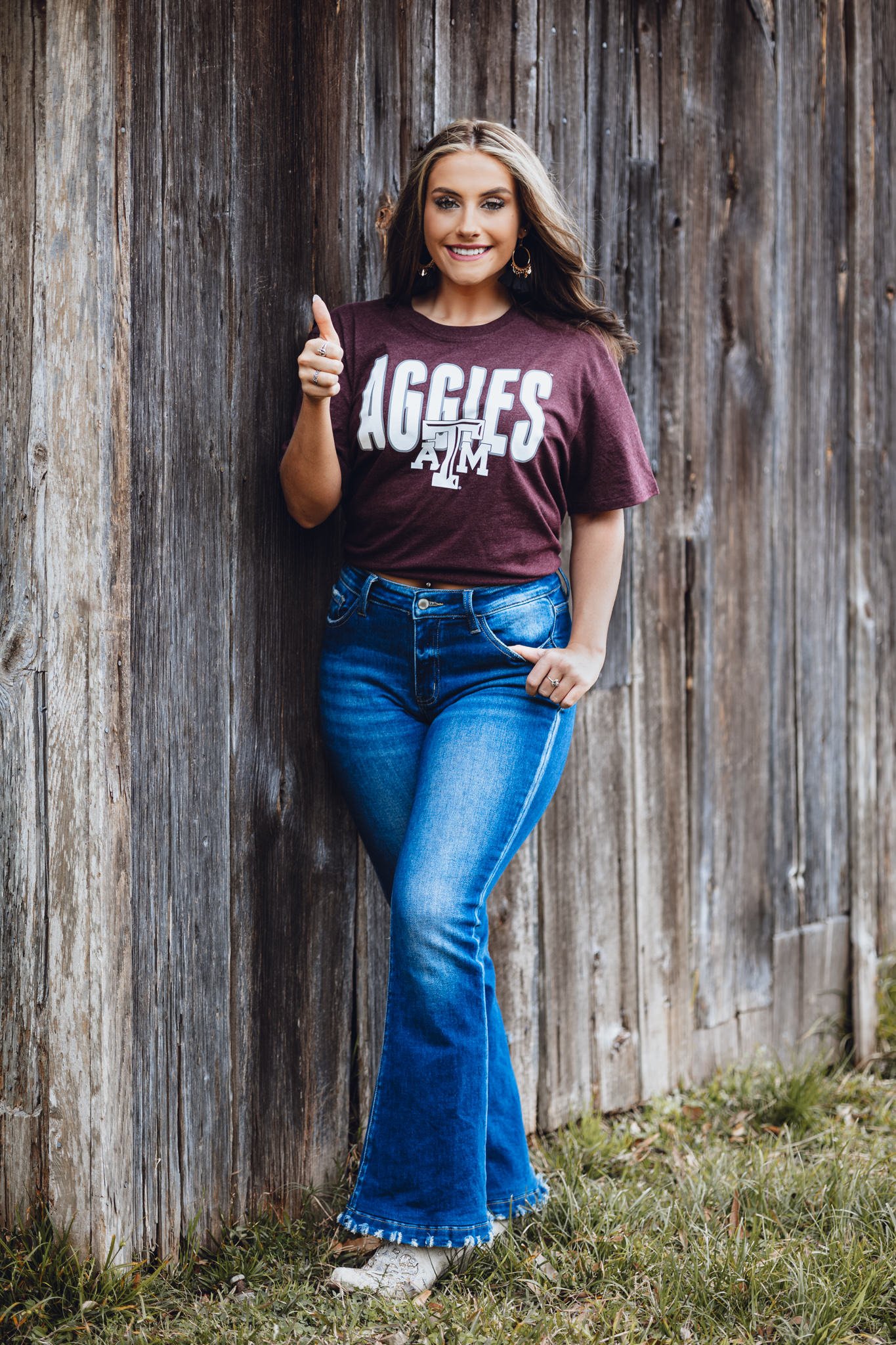 senior girl college Texas a&amp;m shirt western boots jeans