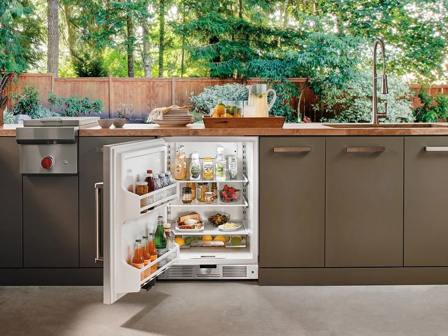 24" OUTDOOR UNDERCOUNTER REFRIGERATOR - STAINLESS DOOR - UC-24RO The UC24RO delivers a generous 5.7 cu. ft. of storage. An easy-access touch control panel adjusts temperatures from 34°F to 45° F, helping keep food fresher longer. Organization is easy, with adjustable spill-proof glass shelves, clear utility bin for smaller items, and two-liter bottle storage in the door. Bright interior lighting makes everything easy to spot, even at night. And the stainless steel door with pro handle is a perfect match for any Wolf outdoor grill. 