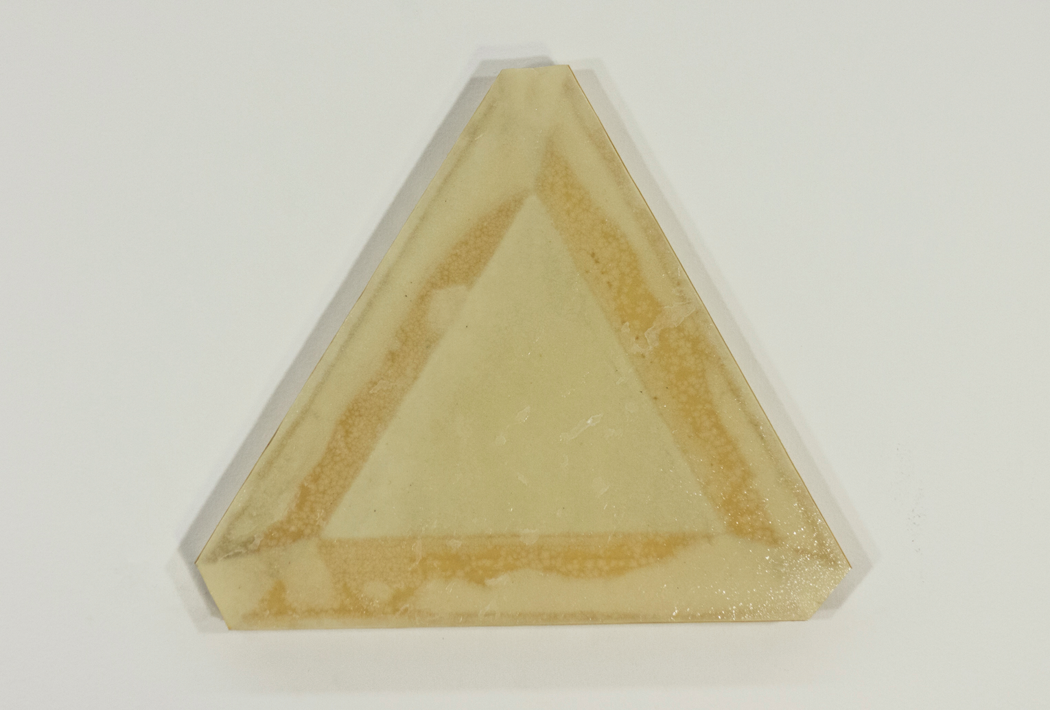 Triad; three 10” stretcher bars, blotter paper, resin; 9 ½ x 11”
