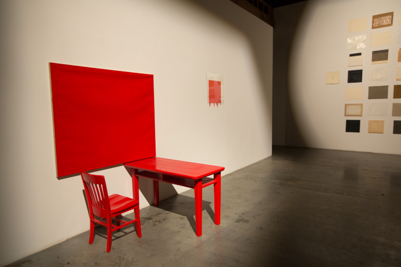 Cadmium-Vermillion (Barium) Red, Medium – Studio; table, chair, oil on canvas, oil painting on wall with resin on glass overlay; dimensions variable