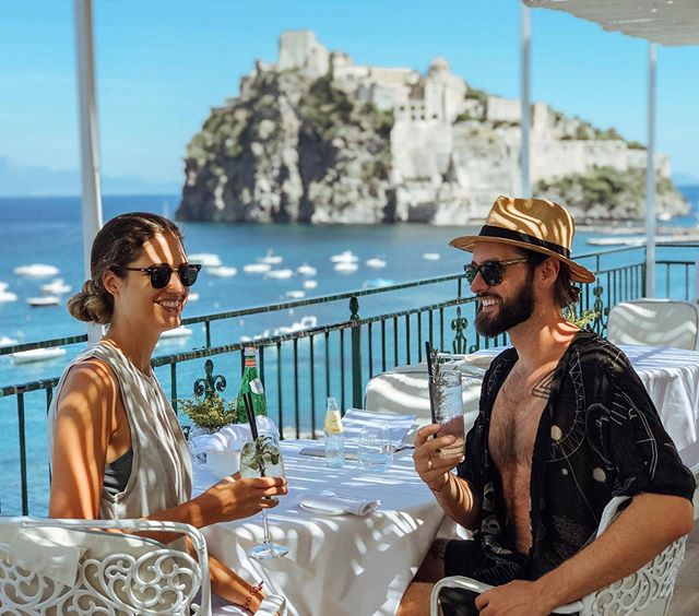 Our new favorite hobby: cocktails on patios overlooking castles. That&rsquo;s reasonable...right?