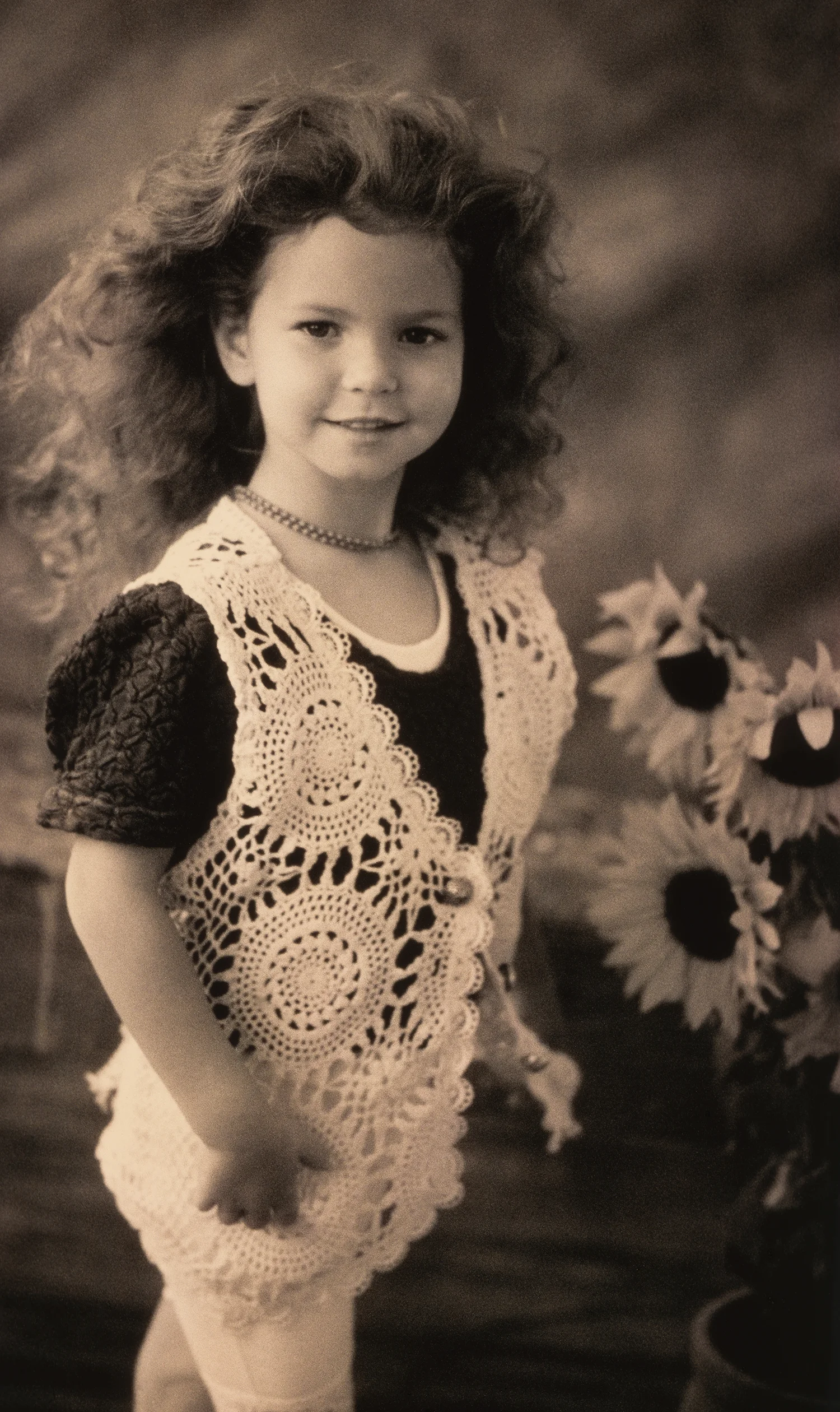 Little Girl with Sunflowers