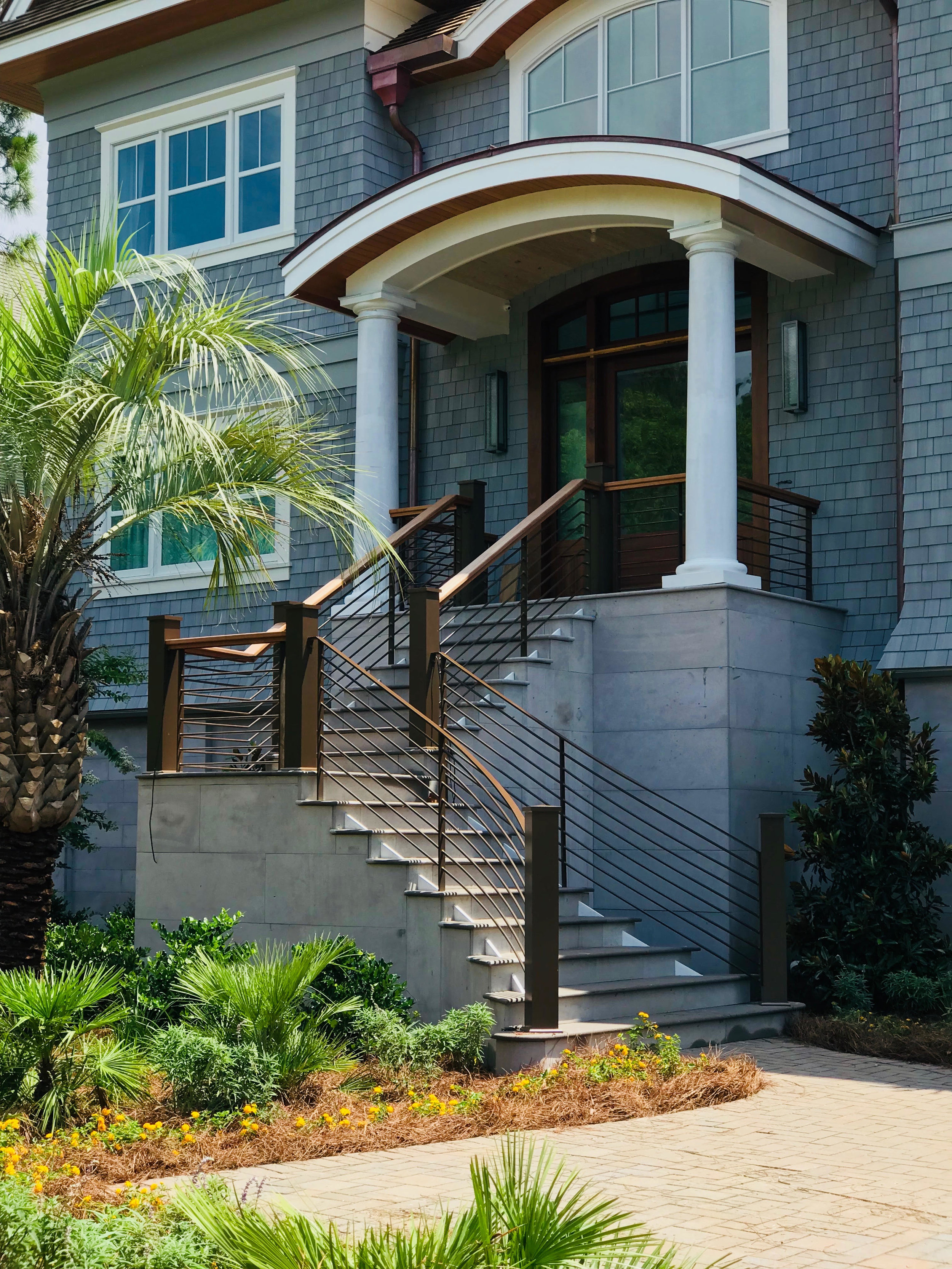 Gris Plateado Custom Stair treads Front Entry.jpg