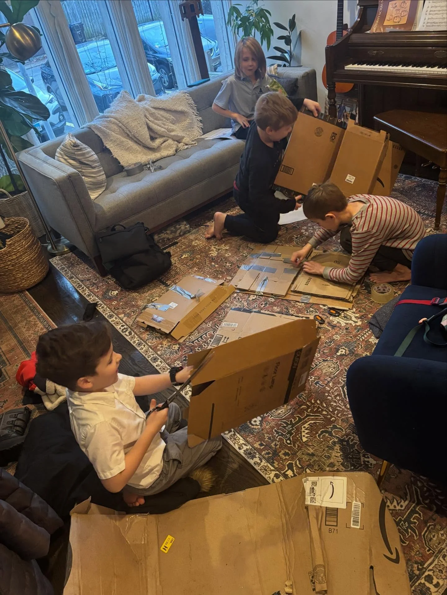 Our co-op community parents banded together to create some simultaneous screen-free time for our kids. Sunday is 100% screen free. These boys entertained themselves for hours with nothing but cardboard, scissors, and tape. They worked together and br