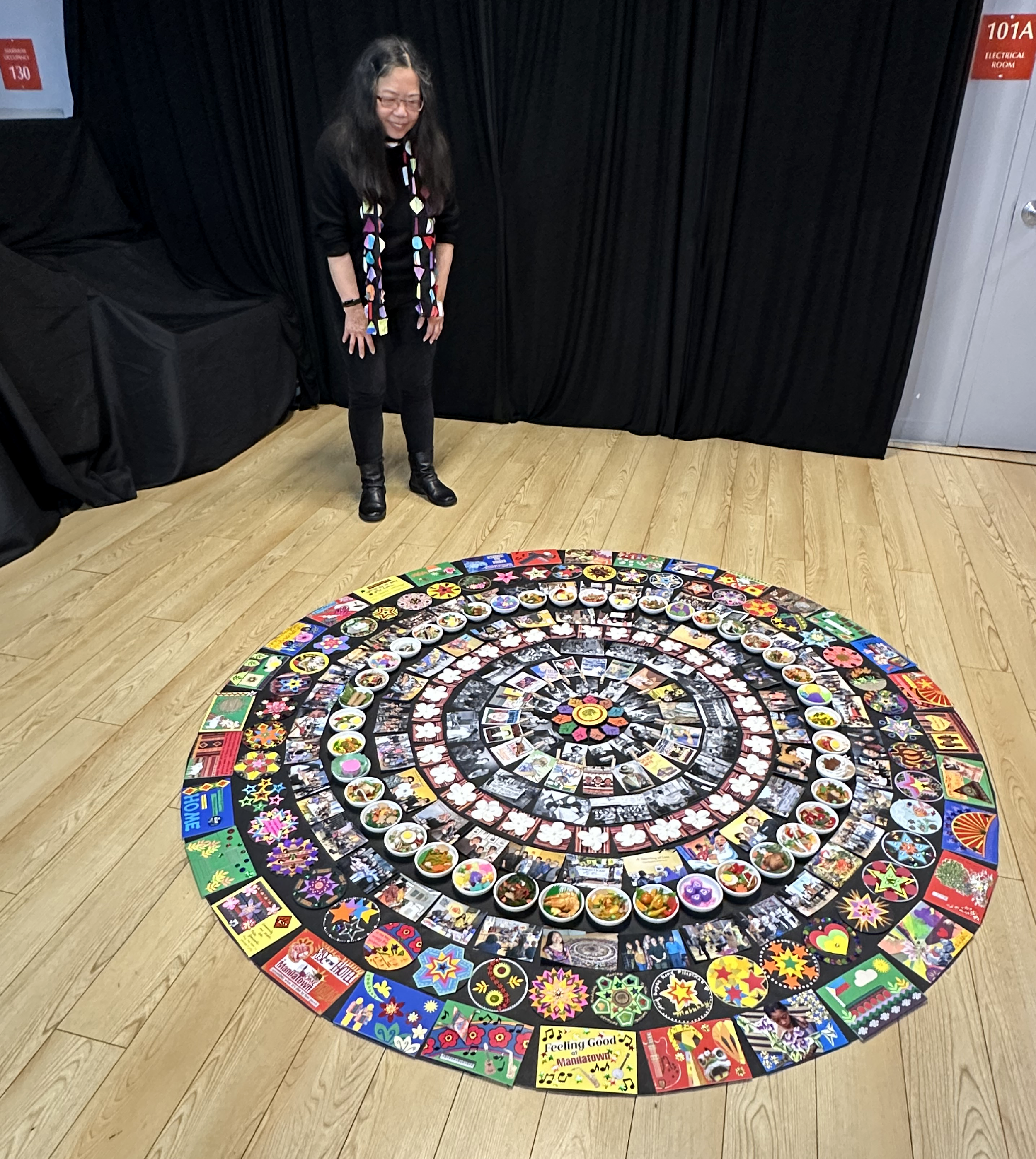 Nancy looking at Mandala Manilatown_4737 copy.png