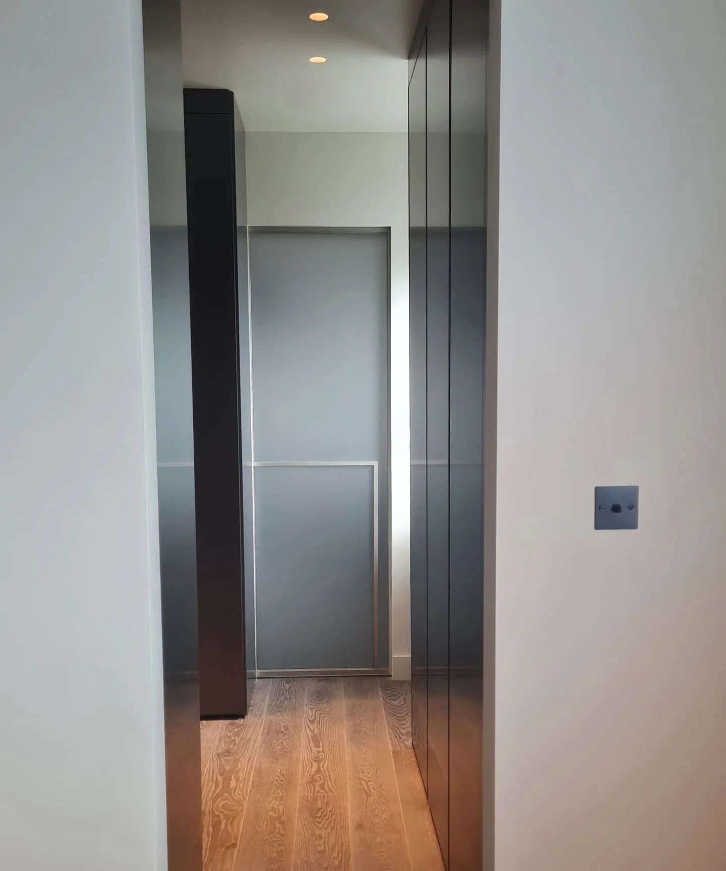 Master Bedroom - London UK | 2023
We have created this stunning master bedroom wing by combining three adjacent rooms. The result is a grand bedroom with a walk-in wardrobe and a master ensuite wetroom. Featuring Italian-design storage units, archite