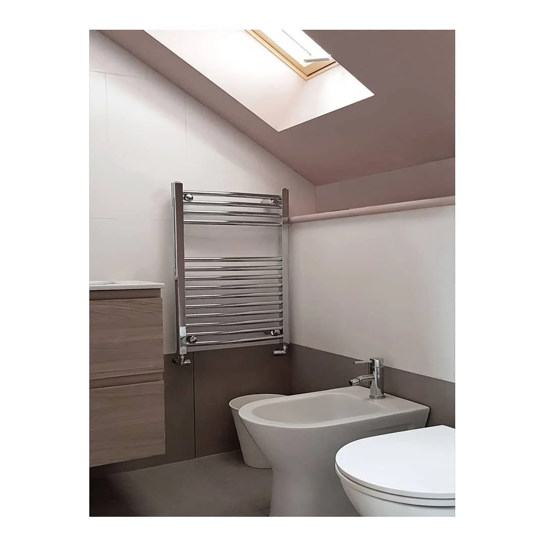 Loft Conversion • A calm EnSuite with abundance of natural light and textures. A wooden skylight and gentle desaturated pink paint contrasting with a richer floor tile that returns up the walls creating a feeling of an expanded floor area.
.
Pro