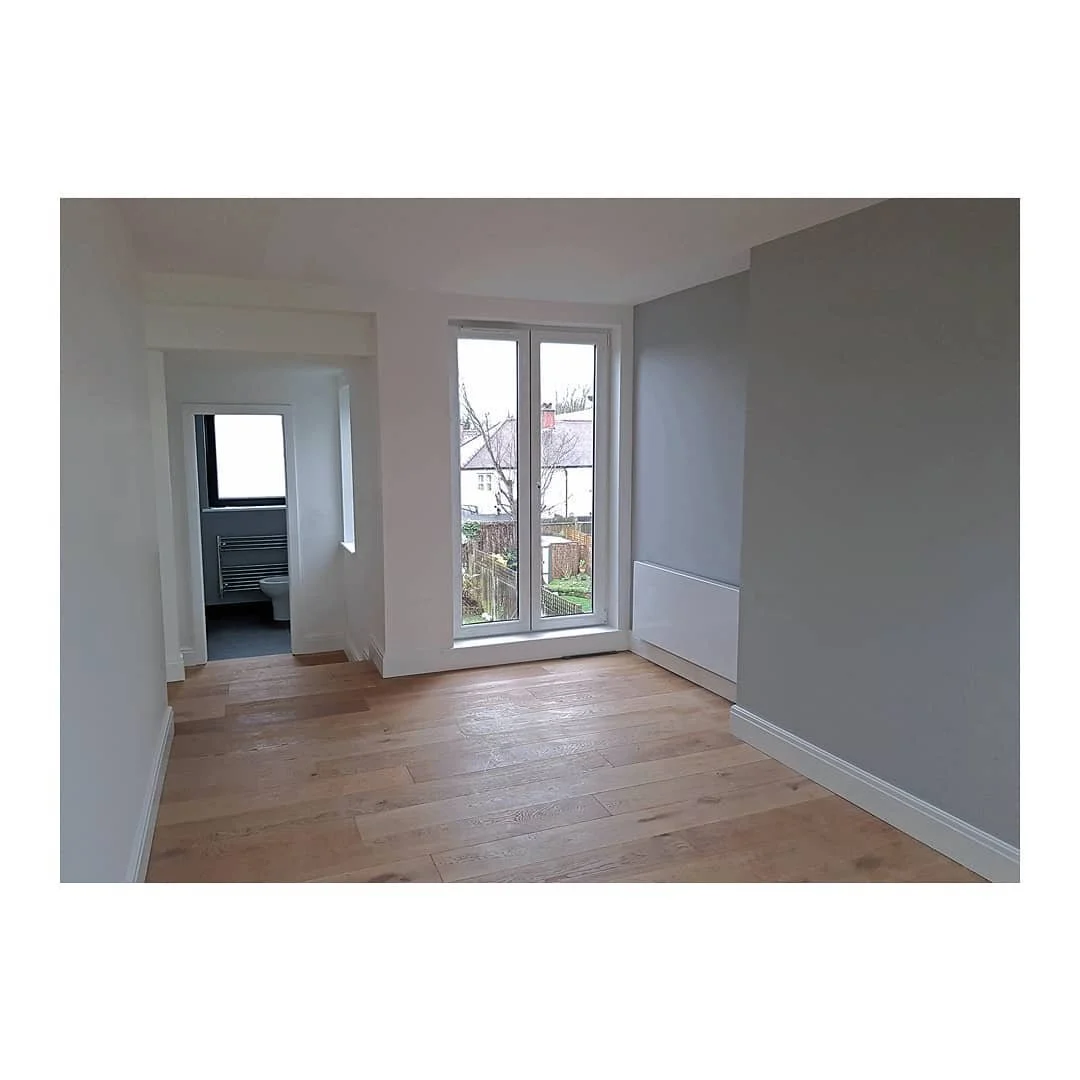 Loft Conversion | Open plan loft with oversized skilights towards the front, eaves storage, Juliet-balcony paired doors, walk-in-wardrobe and rear En-Suite. Deep perspectives of the sky combined with natural light, air, organic textures and subtle to