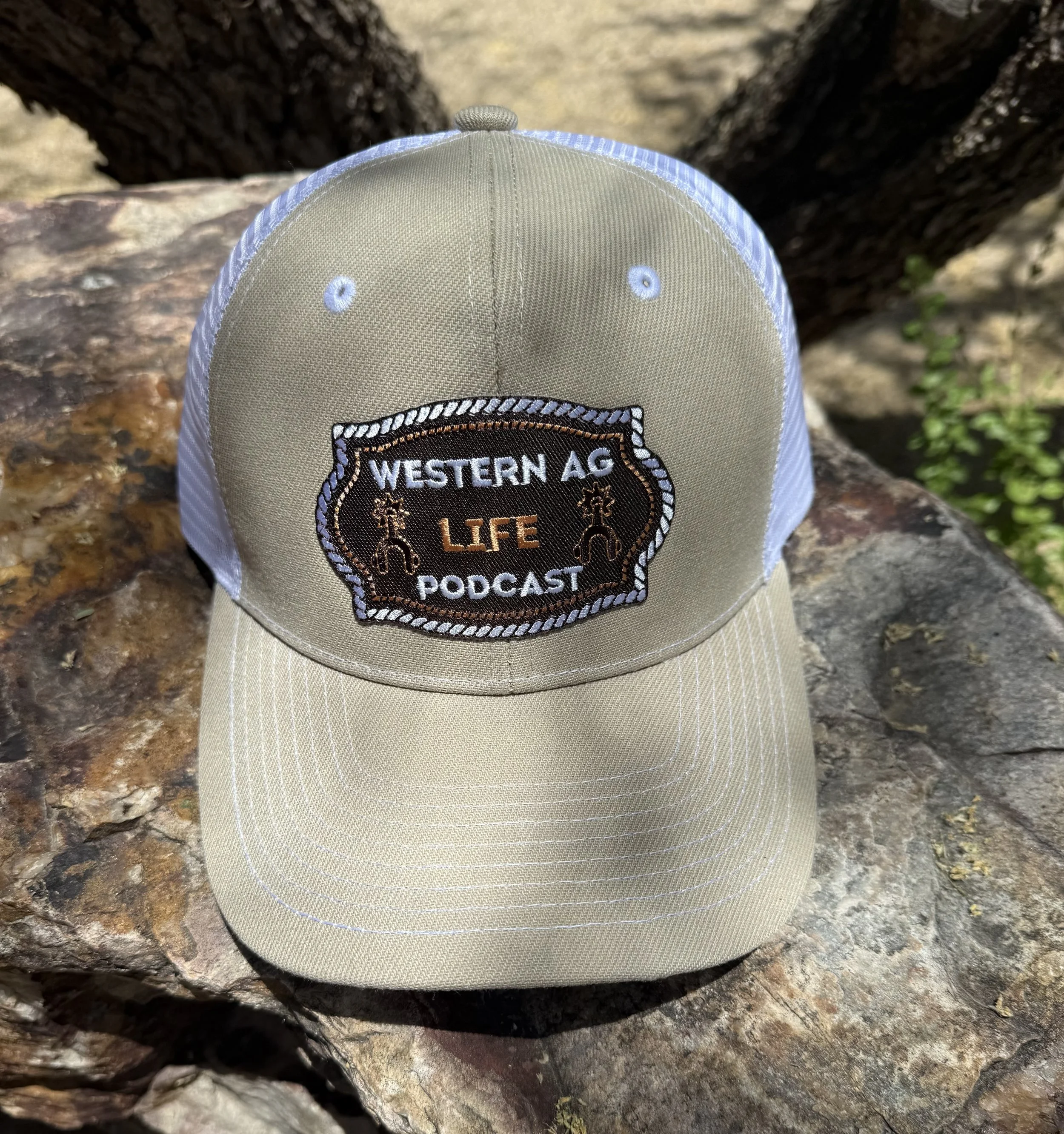 Western Ag Life Cap- tan and white