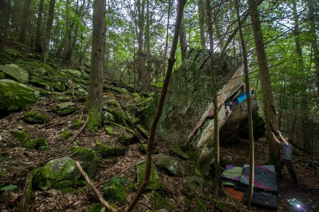 The author climbing the Petrified boulder in Upper Middle Creek. Photo by Micah Gentry.