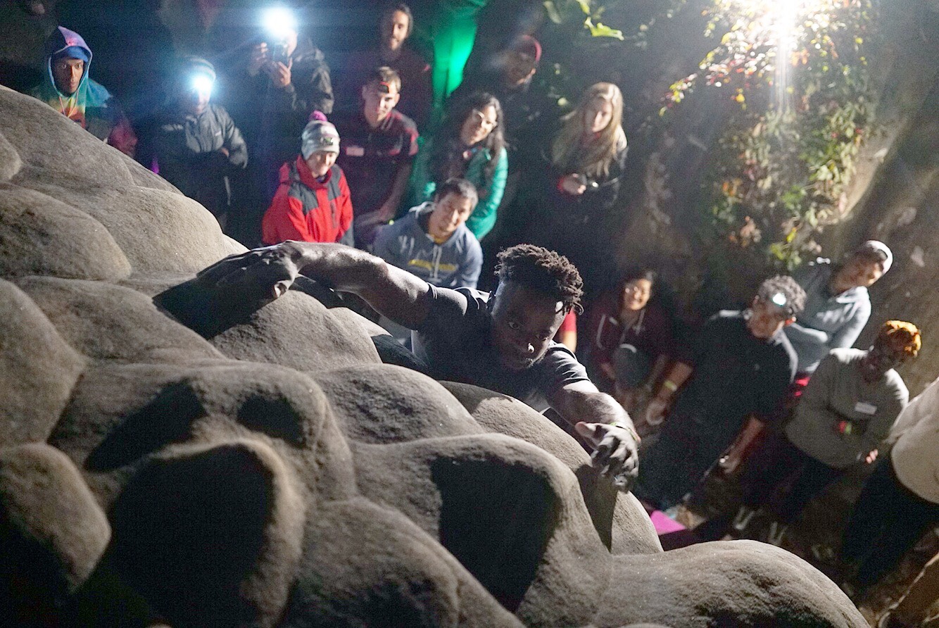 A climber grabs the gritty slopers of Bumboy during a night bouldering session in the Middle Area. Photo by Lam Thuy Vo. Courtesy of Color the Crag , Brown Girls Club, and BOC Crew.