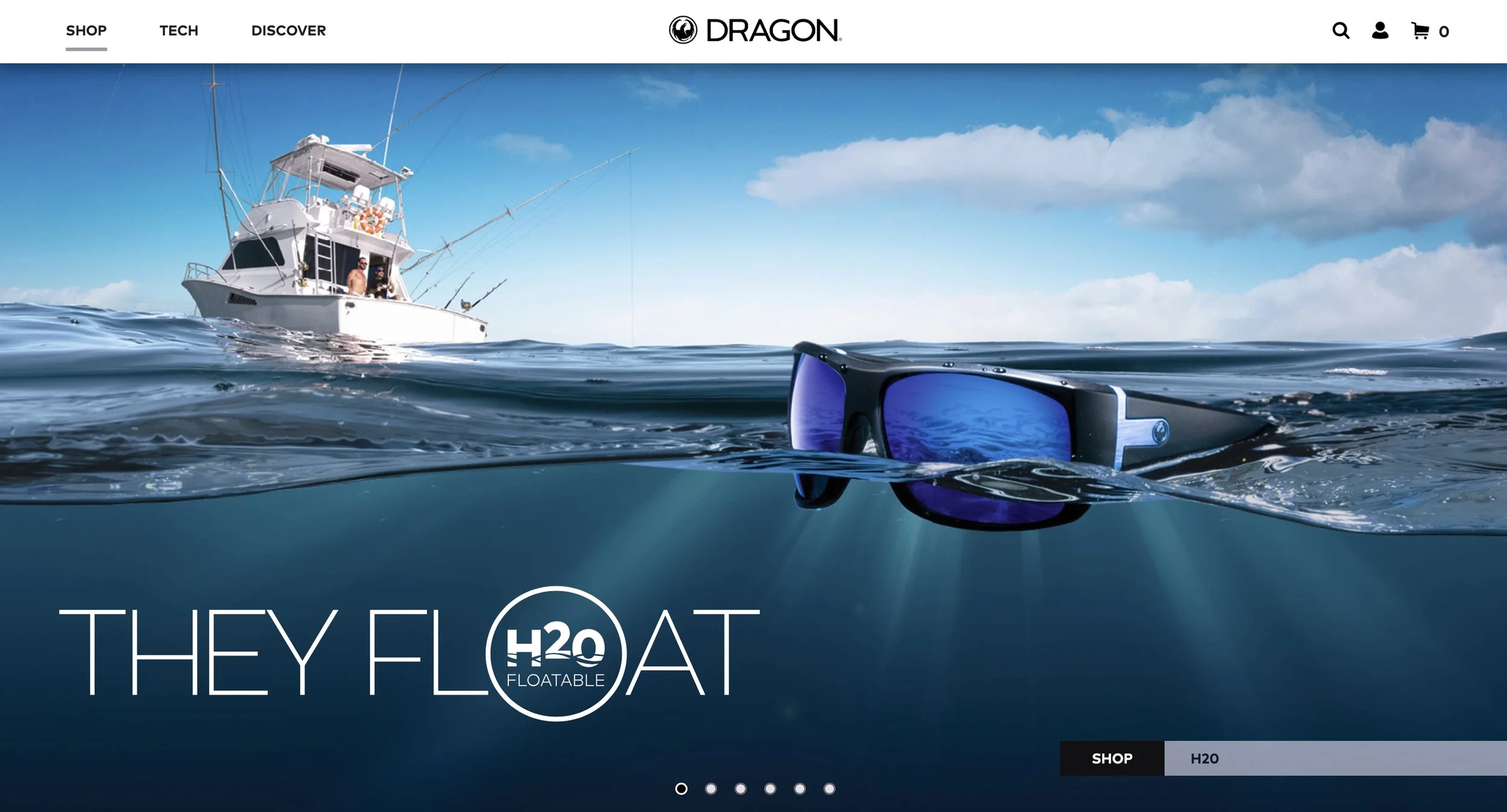 A boat on the ocean with a pair of blue sunglasses floating in the water and a slogan 'They Float' with a Hydrogen H2O logo, indicating floatable water gear. The sky is partly cloudy.