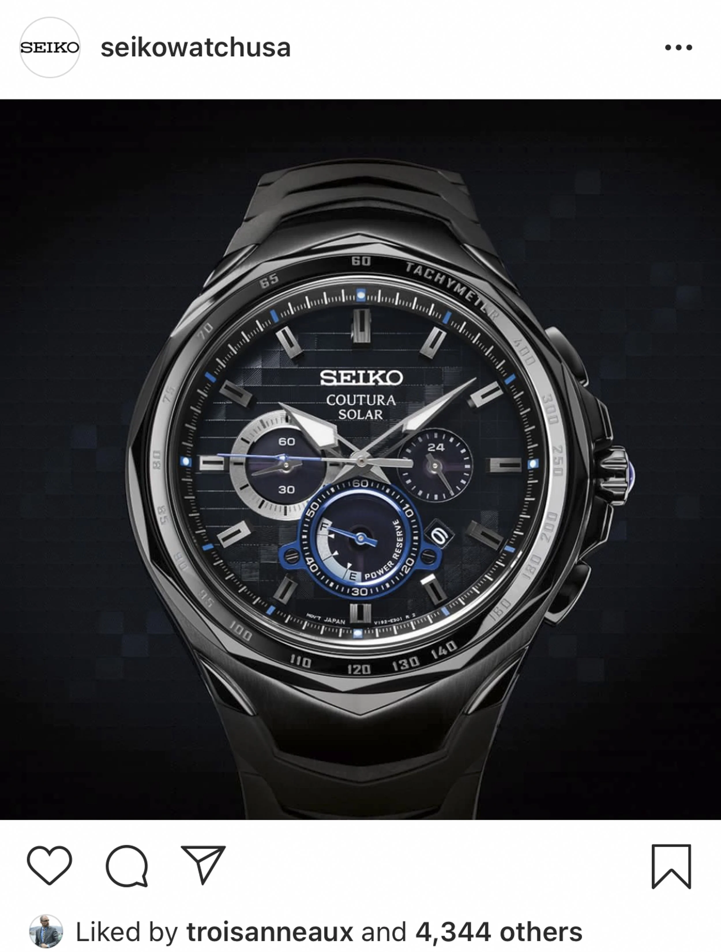 Seiko Coutura Solar wristwatch with a black and blue dial, chronograph features, and multiple subdials, on a dark background.