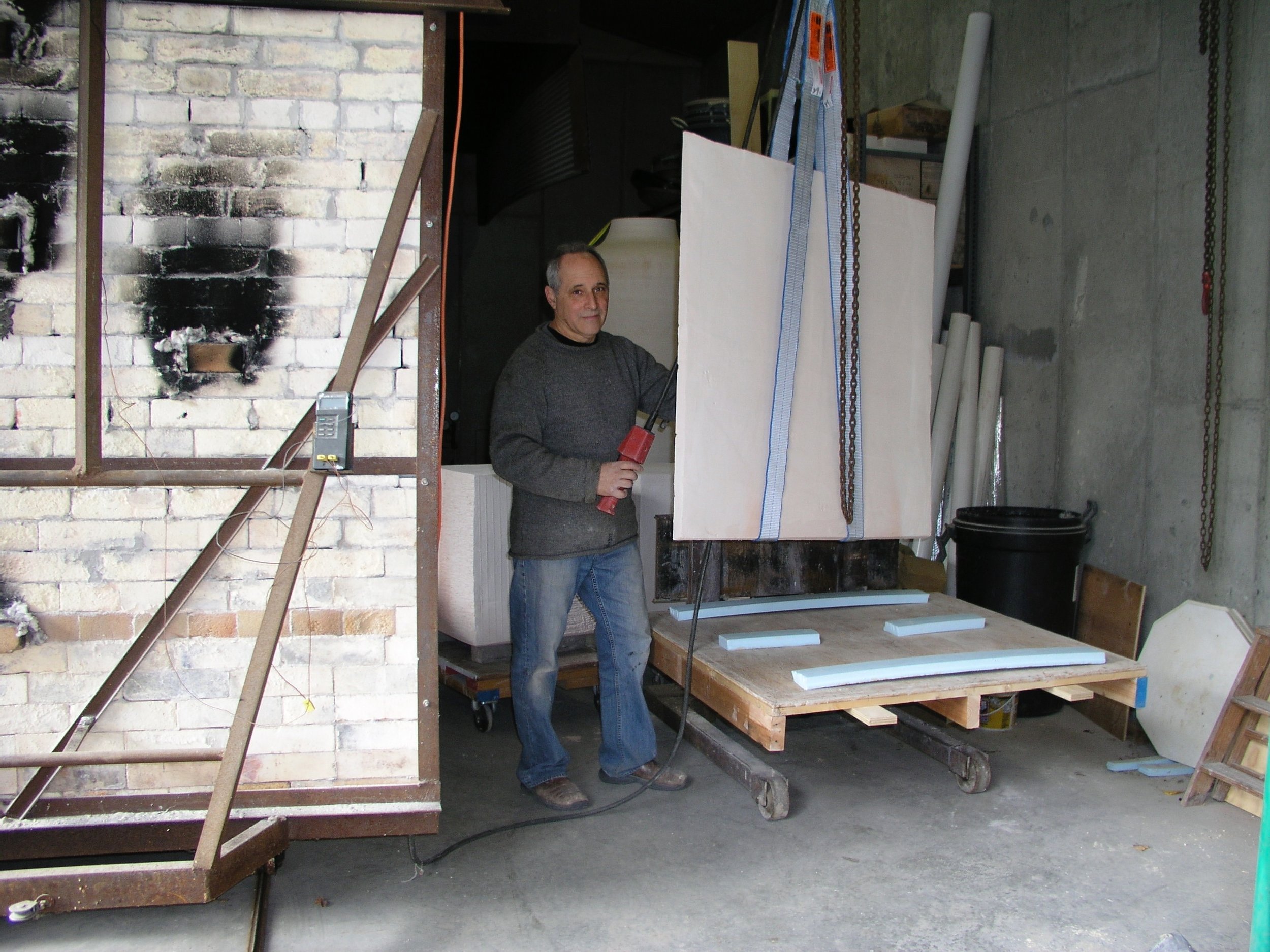 Loading tablet into kiln 2014.jpg