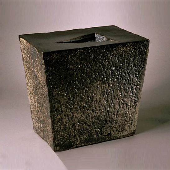 crucible with conical depression