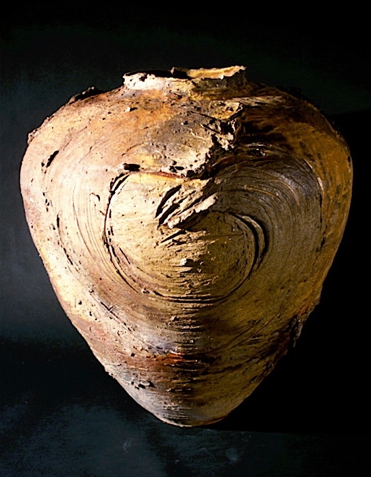 large wood-fired jar with symbols 