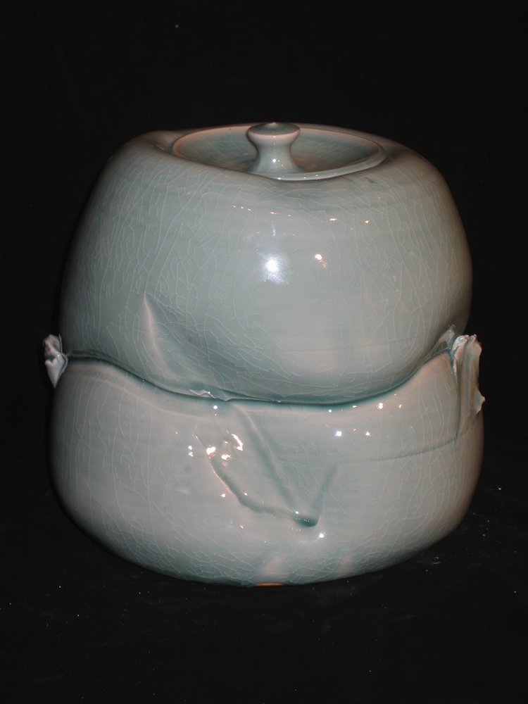 porcelain elephant foot covered jar form 