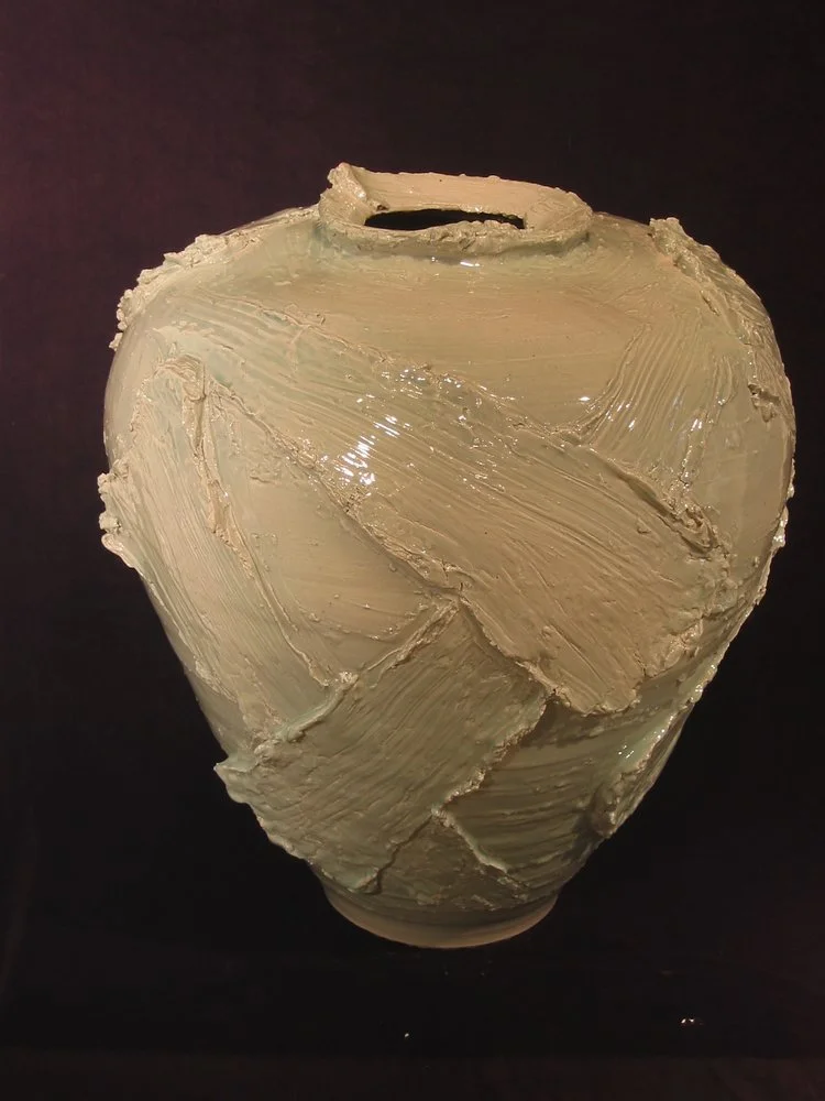 large blue porcelain jar form with applied slabs