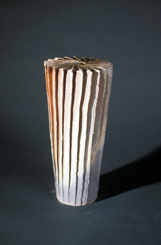 cut and faceted vase form 