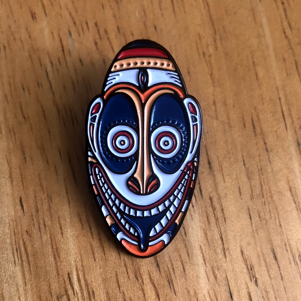 trader sam's enamel pin oceanic arts mask