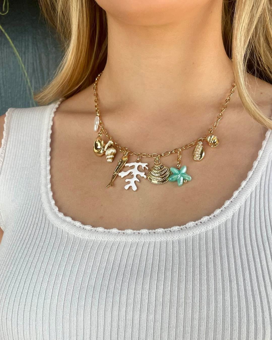 Coastal Charm Necklaces 🐚✨

How adorable are these charm necklaces for summer? So tropical, so fun&mdash;perfect for sunny days and seaside vibes! 🥥☀️🌴
Get yours this weekend at Sequels&rsquo; Summer SALE for 20% OFF!