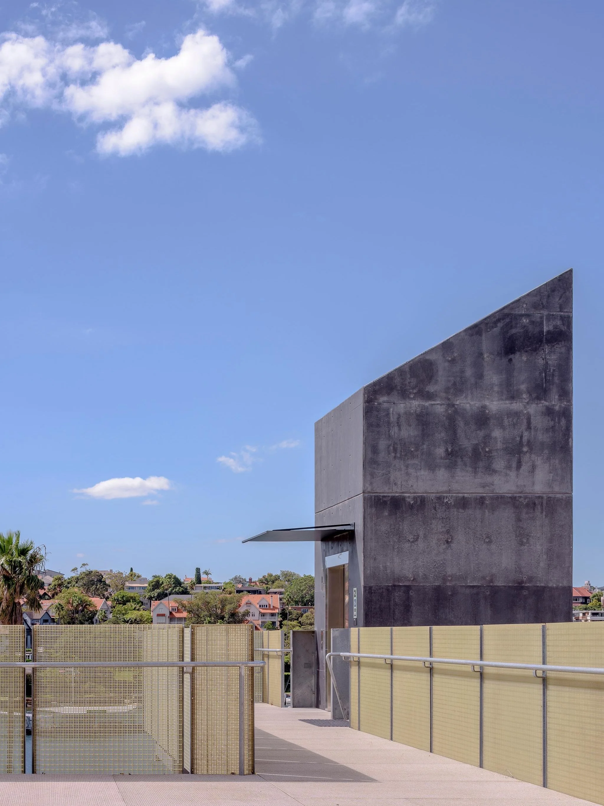 materials in mind.

Located on Cammeraygal Country, the Sub Base Platypus renewal navigates a tension central to any heritage site, how to intervene without overwriting.

Green FRP decking threads through the project as both a wayfinding device and a