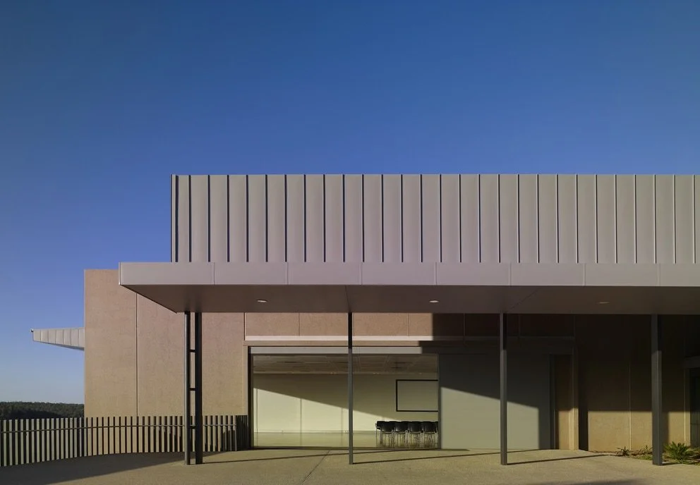 materials in mind.

Located on Gundungurra Country, the Warragamba Dam Visitor Centre utilises an austere palette of precast concrete, glass and steel to draw on from the engineering language of the dam itself, and help rationalise the immense scale 