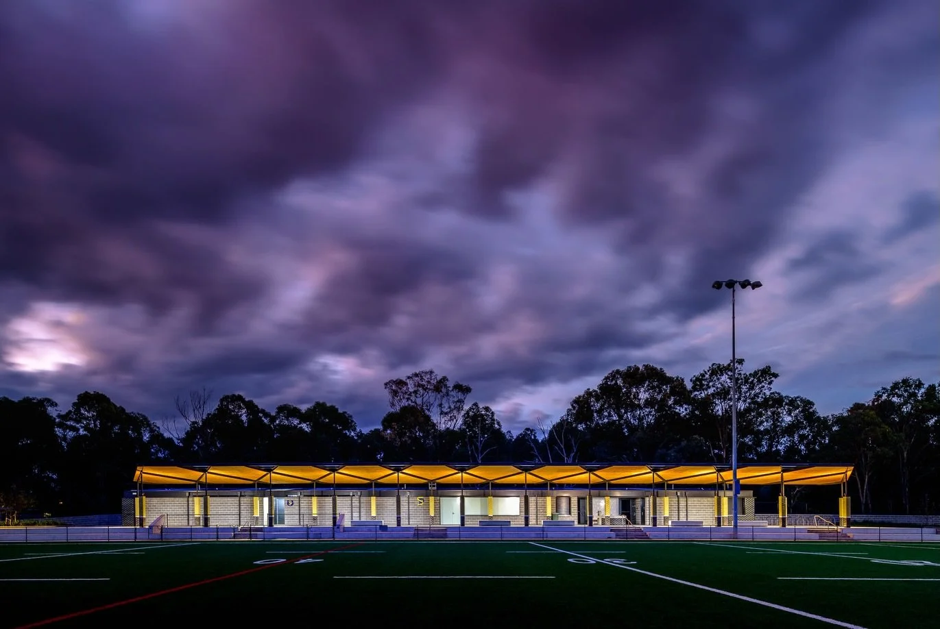 laced up for the NRL Grand Final weekend.

Located on Dharug Country, the Sport Facilities Building at The Ponds Stadium in Kellyville was designed to support local players, spectators and the wider community.

The design draws on the movement of spo