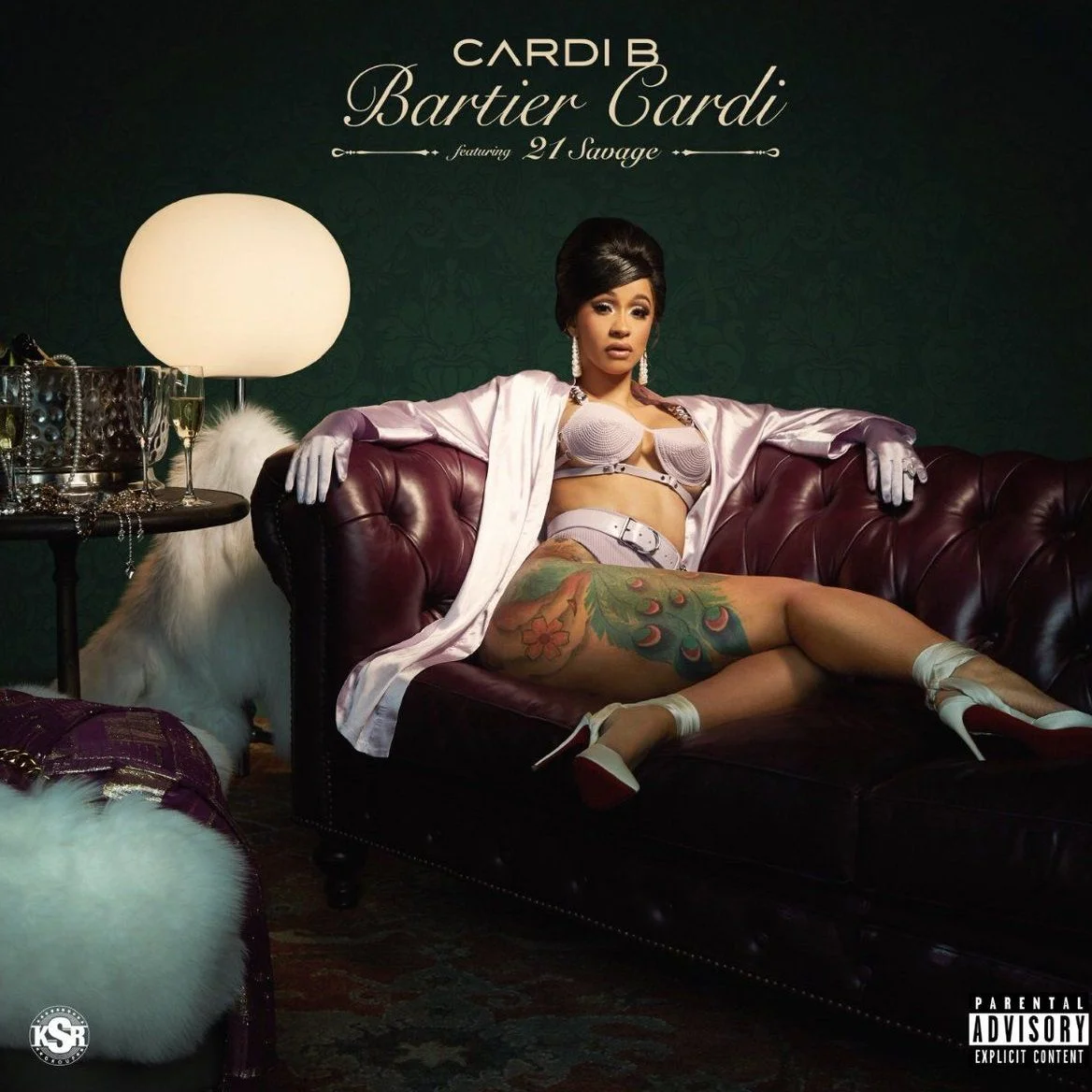 Cardi B Sensually Moves In Red Lingerie In Sweet ‘Bartier Cardi’ Music Video.