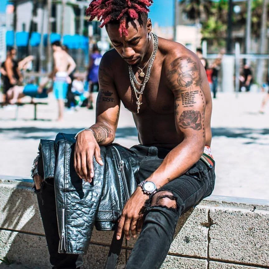 Watch Toronto Rapper Dax Play Santa &amp; Grinch In New Video “Dear Santa”