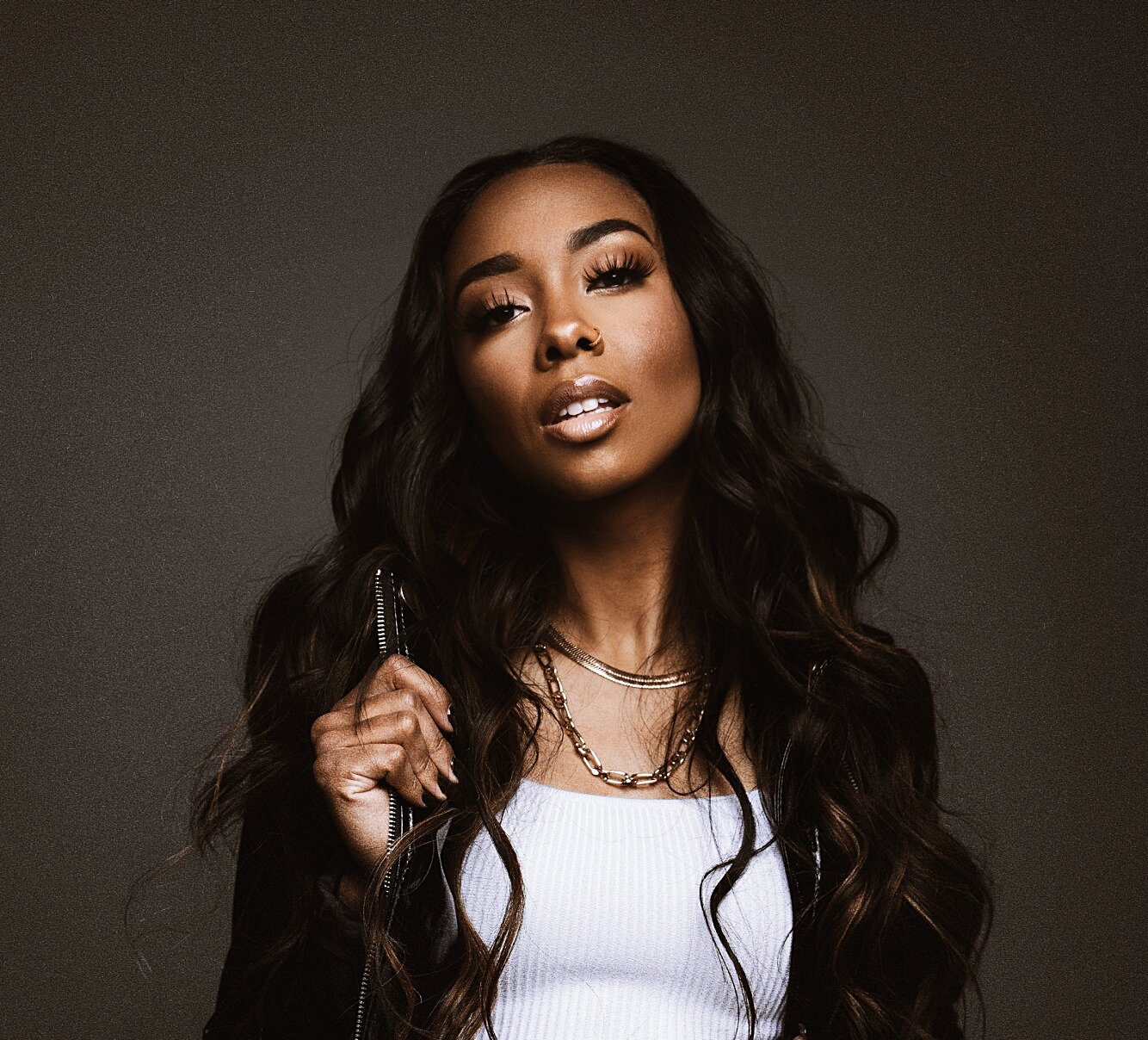 For Valentine's Day, Canadian Artist Q-Benjamin empowers women through her new single "Temptation".