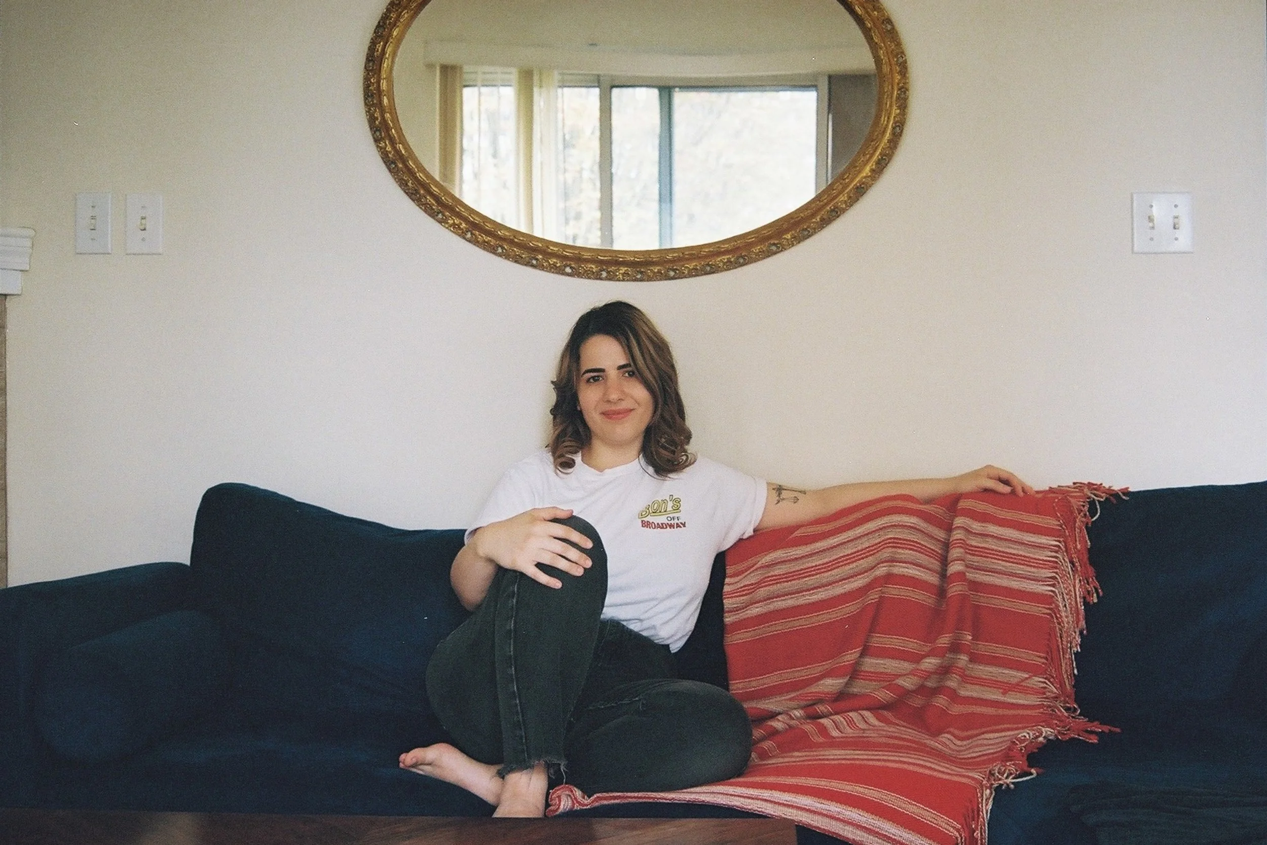 On Her EP “For The Record,” Micae turns bedroom folk into diaristic symphonies of breath, string, and sincerity.