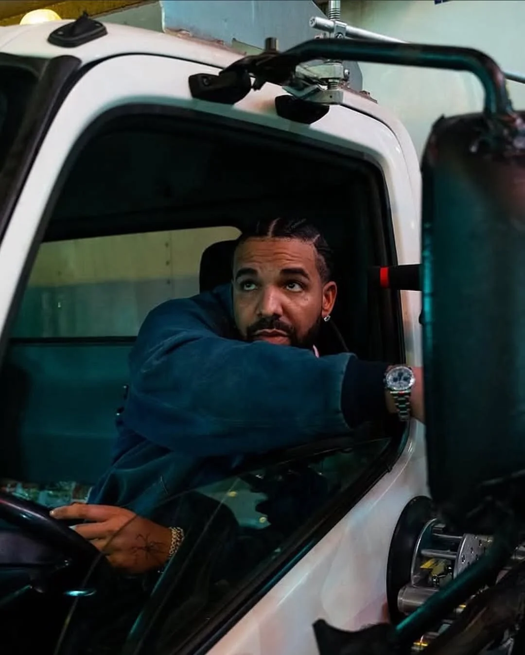 Why Fans Think Drake Used AI After Dropping Three Albums Full of Recent References