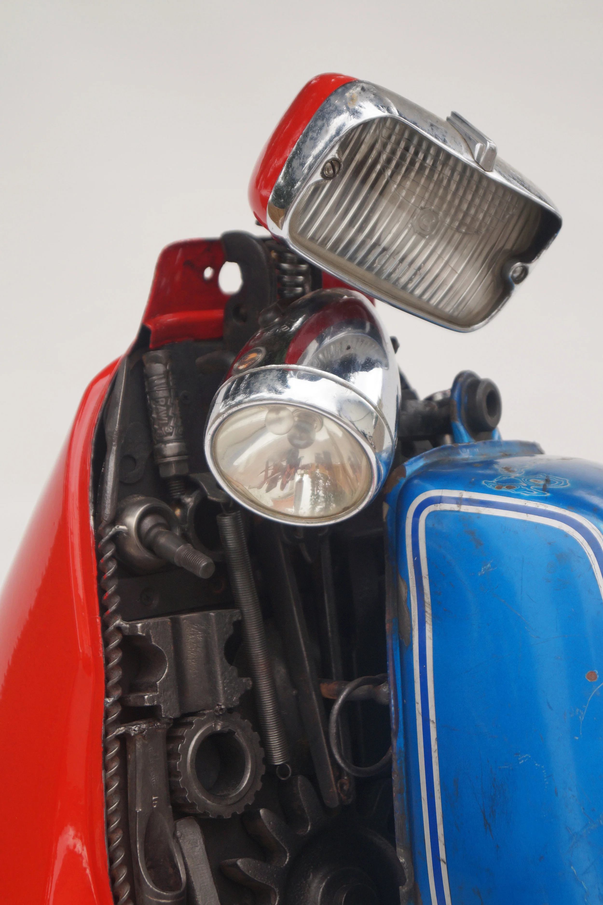 Work made out of scrap metall and old fuel tanks of mopeds.
