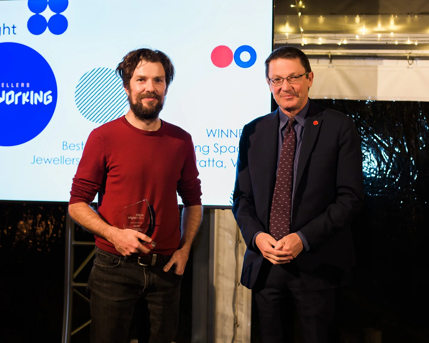 Scot McDonald MC Parliamentary Secretary for Planning, Central Coast and the Hunter presents the 8point8 Wave Award to Rohan Latimer of Jewellers Coworking.