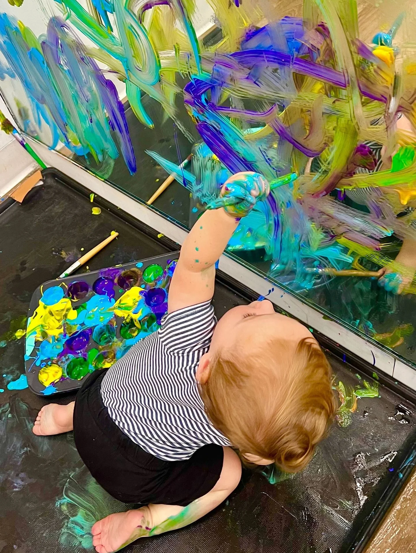 This is the concentration of a real artist! When the colors start mixing, the whole world fades away. It&rsquo;s all about freedom, turning any surface into a giant playground. This is more than just fun; it&rsquo;s the alchemy of childhood, where pl