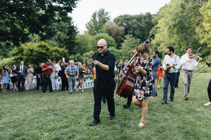 This couple had live musicians lead their guests to cocktail hour.