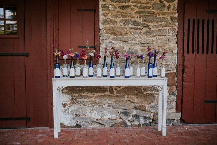 This bride decided to do her seating “chart” on bottles.