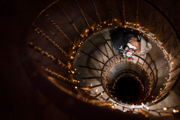 This couple got married in a castle. Love this photo in the spiral staircase!
