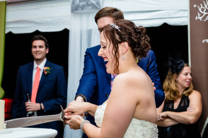 Yes…this couple cut their cake with a SWORD!!