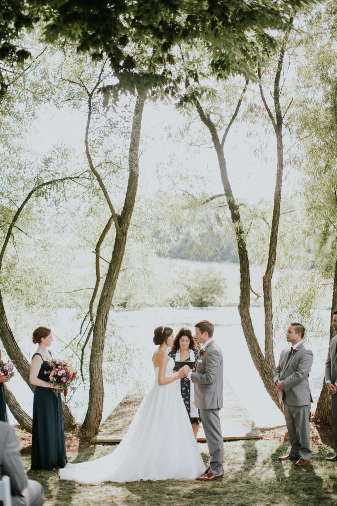 Caitlin and Bryan used one of our favorite officiants – Reverend Reenie Panzini – to marry them! Photo by Sarah Brookhart. 