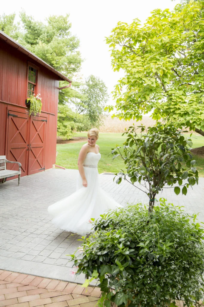 We loved how flowy Sam’s dress was! And she looked so happy (and comfortable) all evening! Photo from Moonloop Photography.
