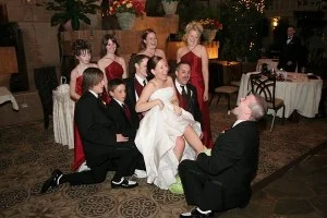 A little surprise I incorporated in to my own wedding...I threw my new hubby off guard when he went to get the garter and found big, green, fuzzy frog slippers on my feet! Everyone thought it was great!