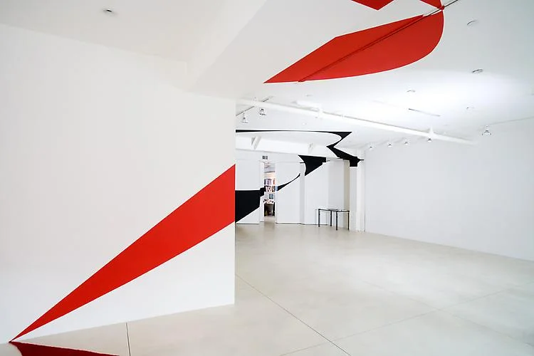 In 2008, artist Felice Varini painted one of his site specific works in the gallery, revealing the architecture as opposed to concealing it (photos courtesy of Demisch Danant gallery)