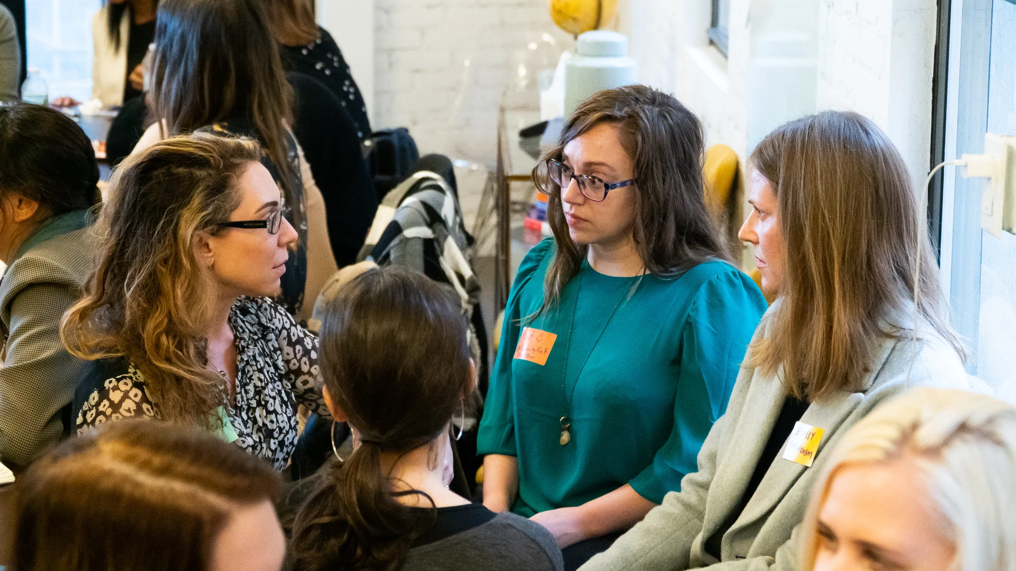 Small group conversations: Alexis Barad-Cutler of Not Safe For Mom Group , Kait Scalisi of Passion By Kait , creative consultant Holly Stevenson .