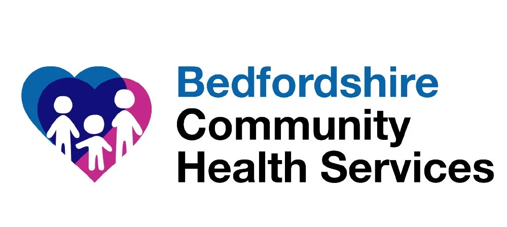 Logo for Bedfordshire Community Health Services featuring a heart with three human figures inside