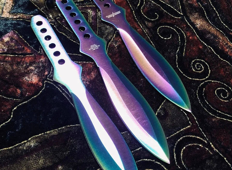 rainbowthrowingknives.jpg