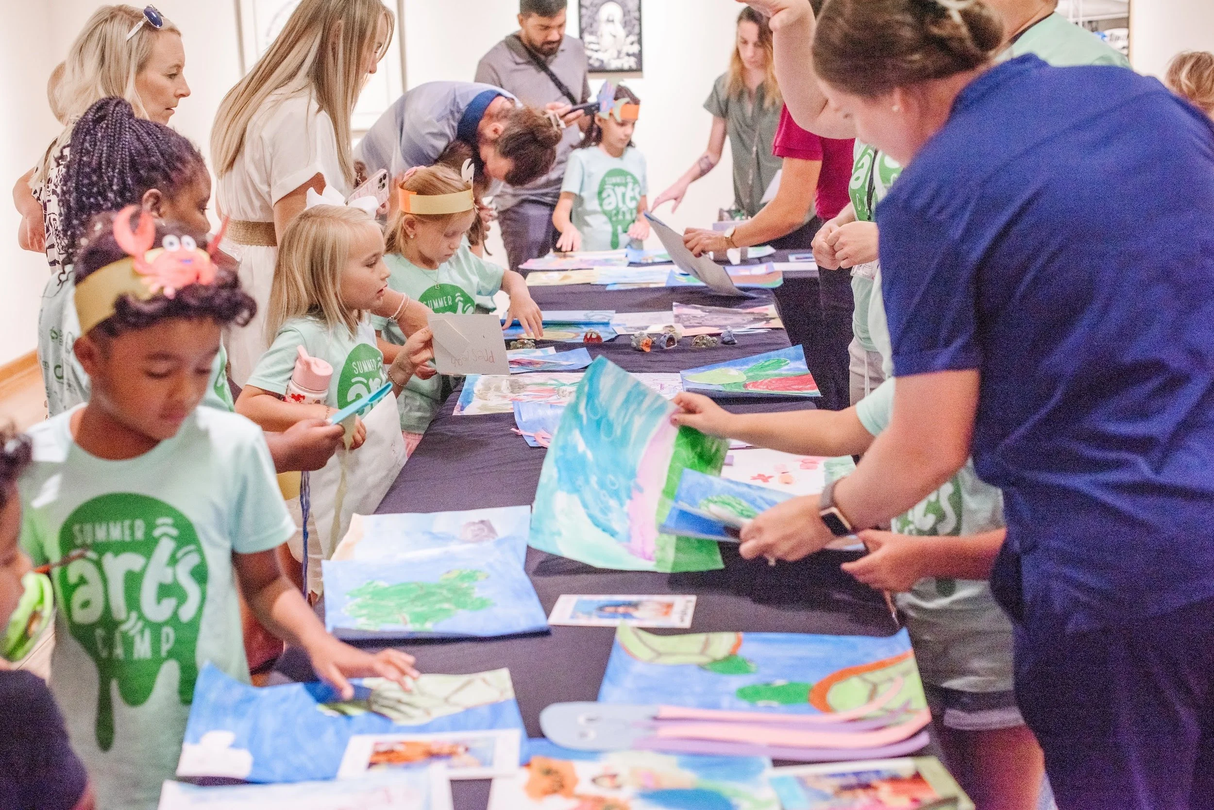 LWAC Summer Arts Camp 2025 10 LARGE GROUP AT TABLE.jpg